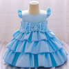 Vestido de ni&ntilde;a de flores de raso con elegancia dorada con lazo en la espalda