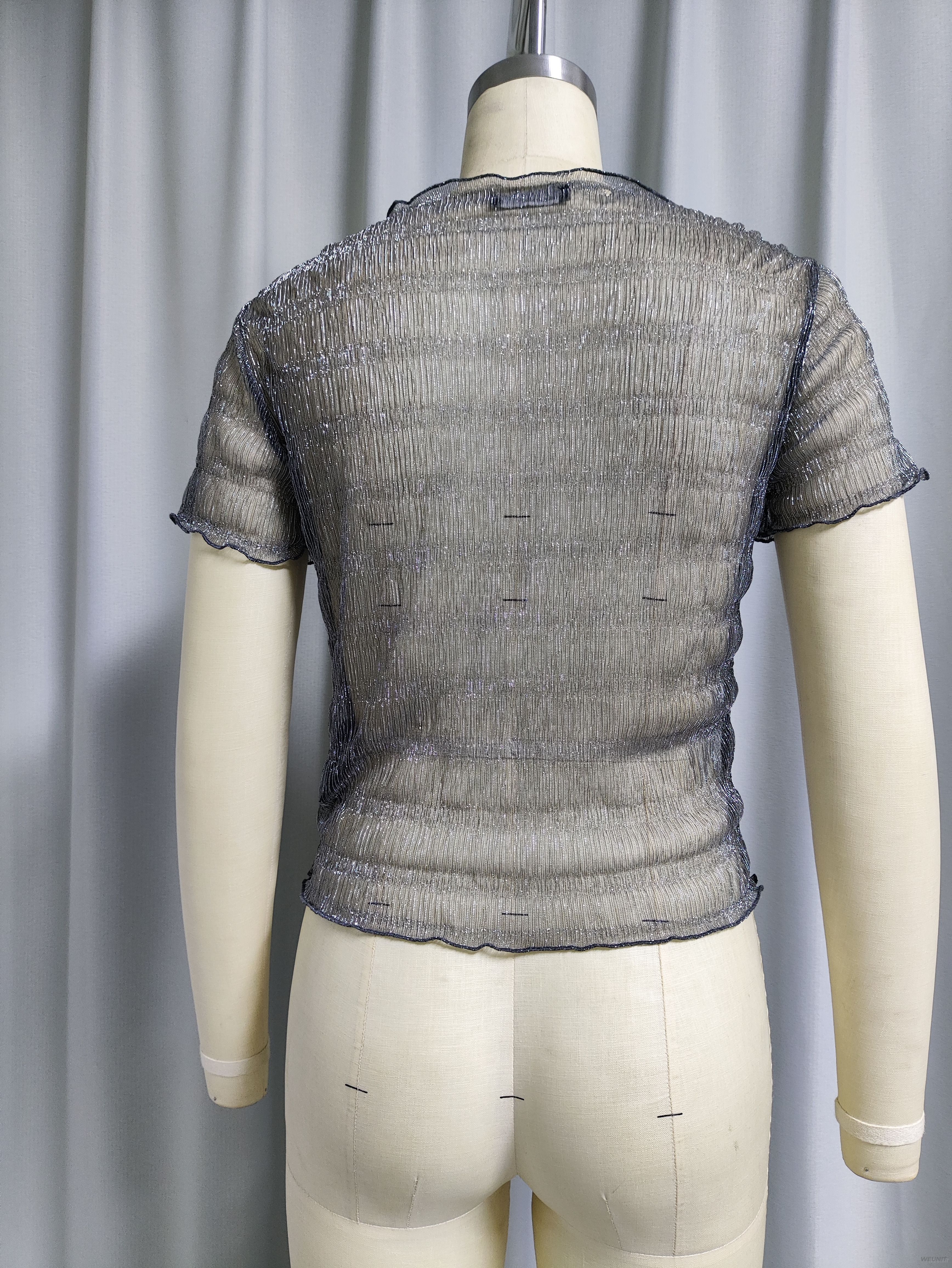 Top corto de manga corta con volantes y brillo transparente