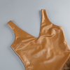 Body de piel sint&eacute;tica de inspiraci&oacute;n vintage con pelo esponjoso
