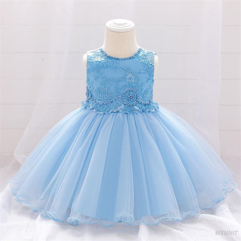 Vestido de ni&ntilde;a de flores de raso con elegancia dorada con lazo en la espalda