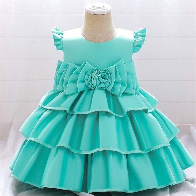 Vestido de ni&ntilde;a de flores de raso con elegancia dorada con lazo en la espalda