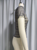 Top corto de manga corta con volantes y brillo transparente