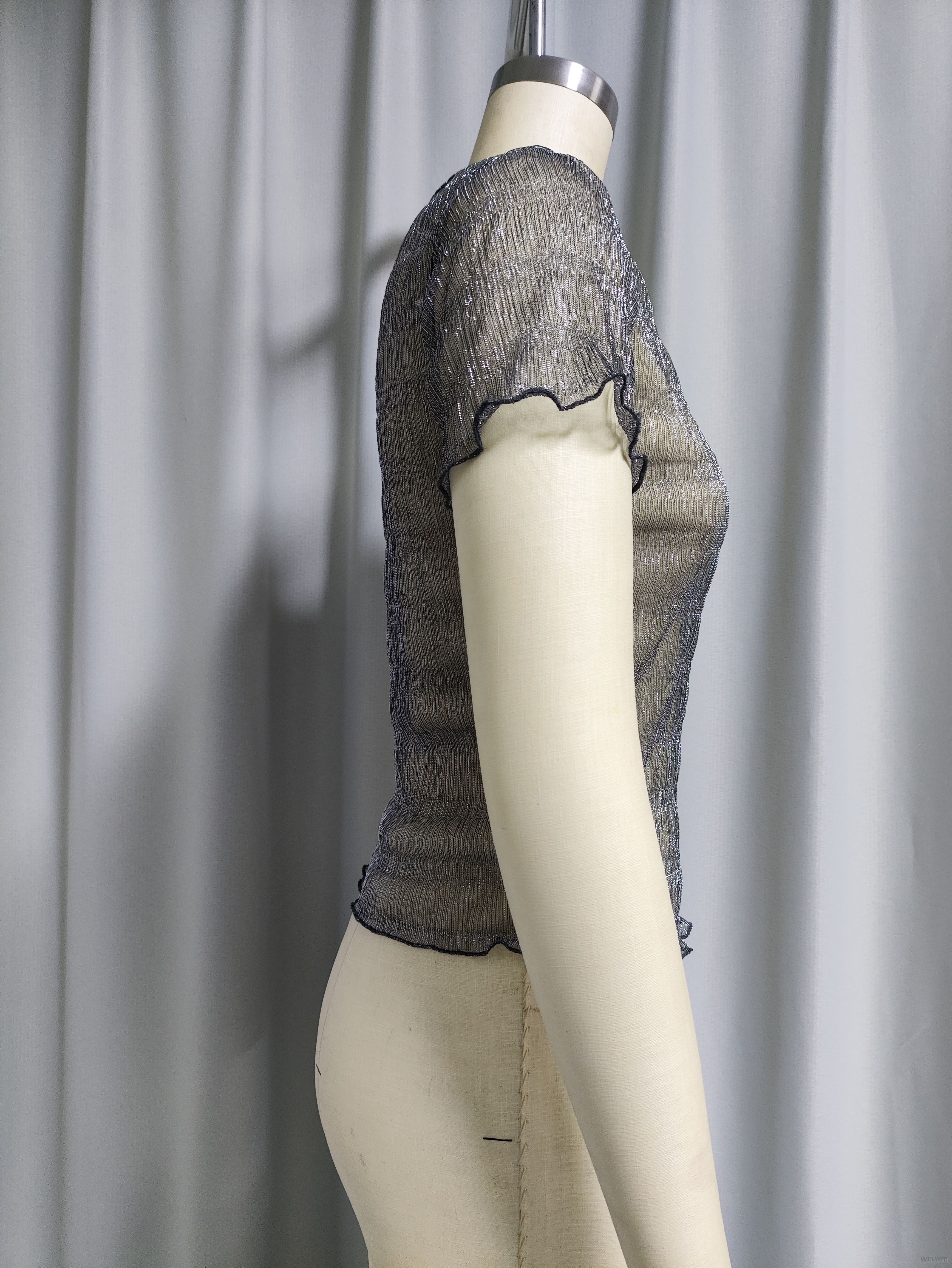 Top corto de manga corta con volantes y brillo transparente